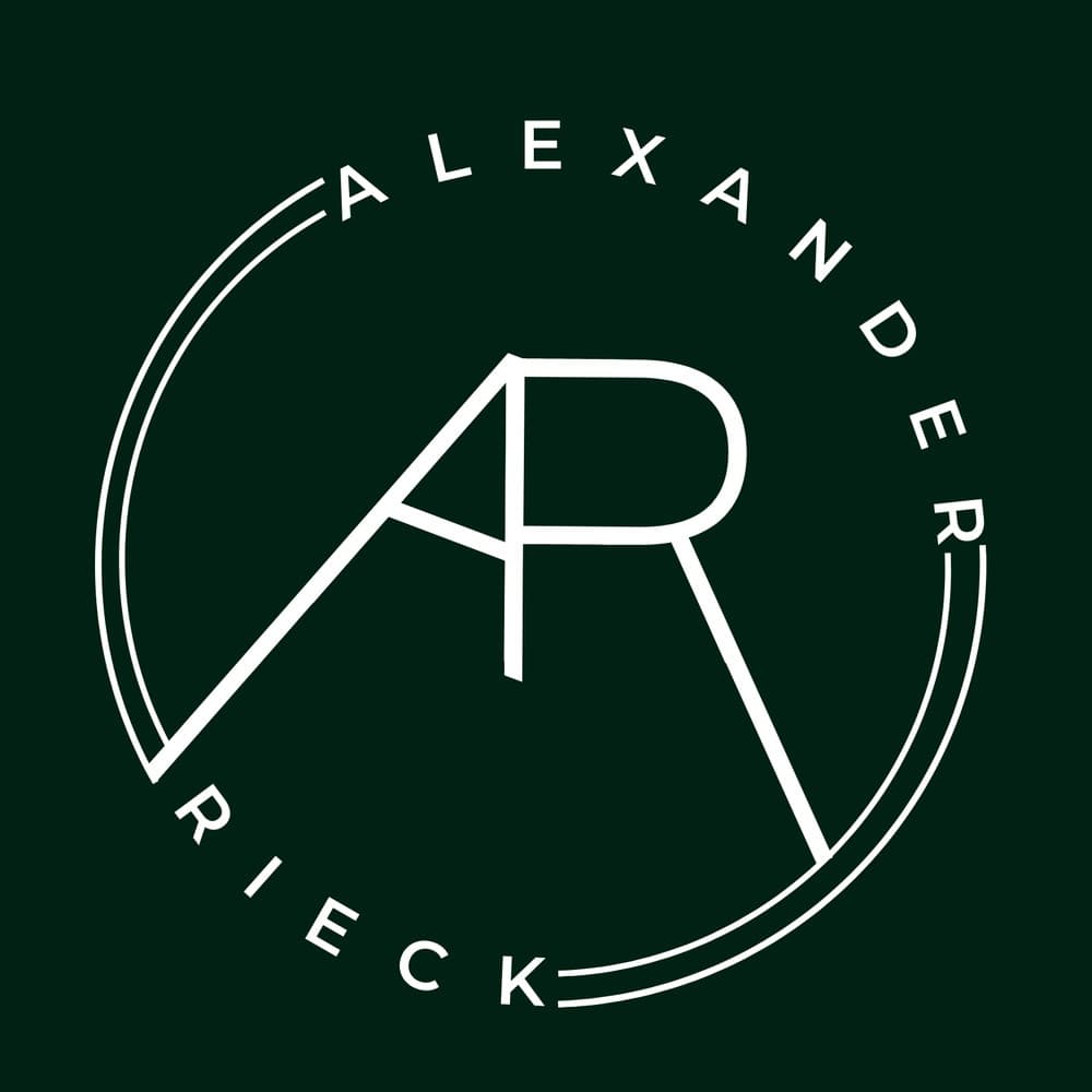 Früheres Signet: kreisförmiges Monogramm „Alexander Rieck“